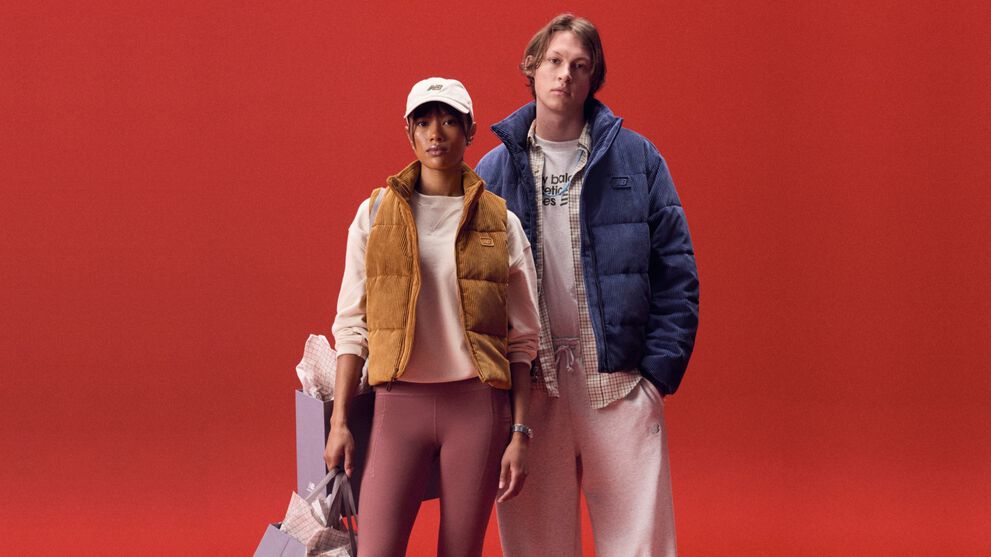 A couple against a red background