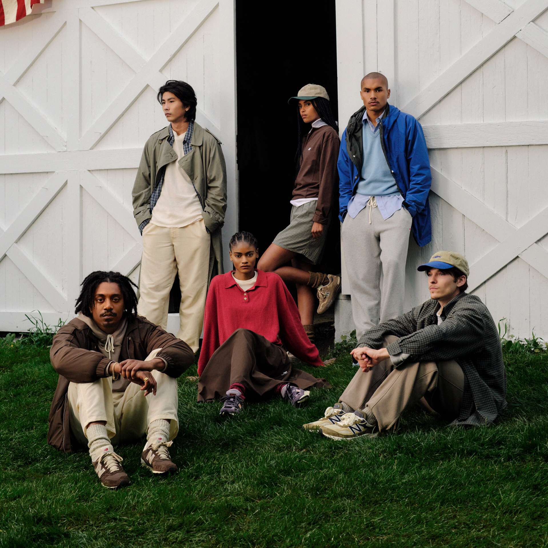A group of people standing in front of a building. 