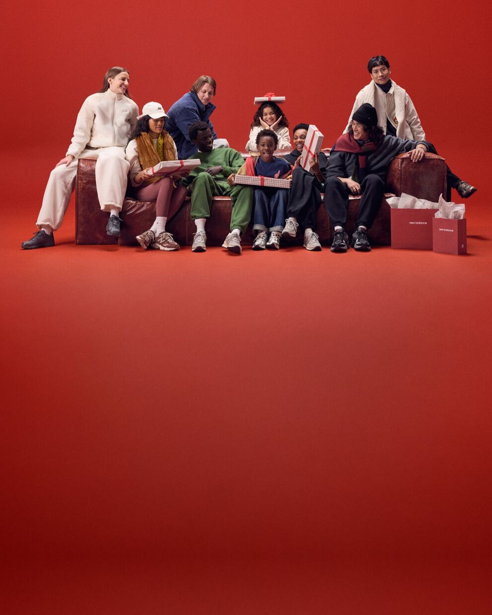 A group of people sitting on a couch.