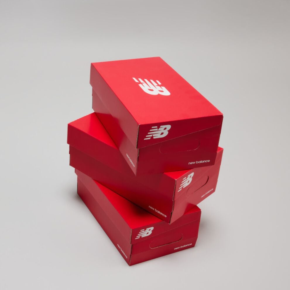 Stack of red NB shoeboxes