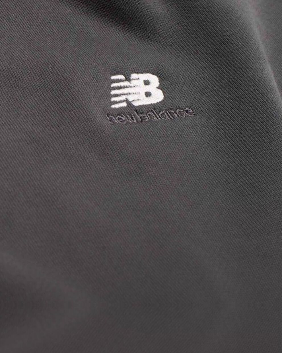 A group of people sitting on a couch.