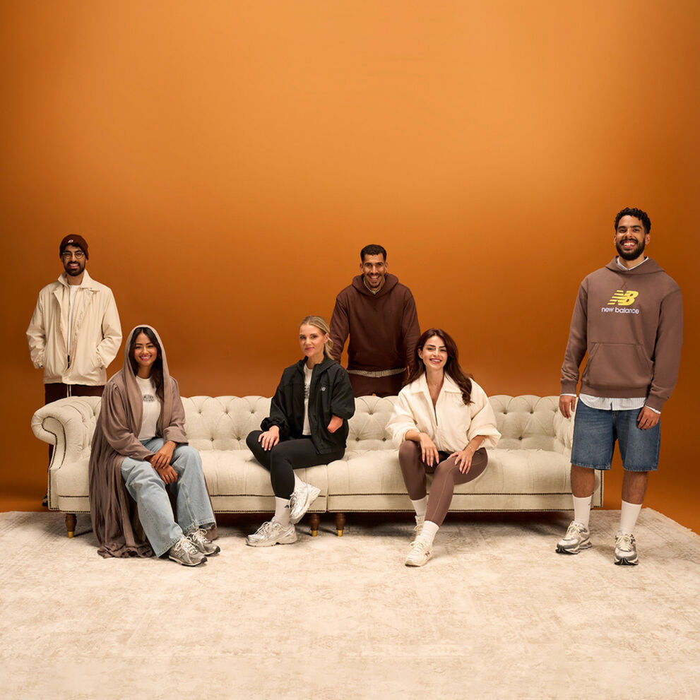 A couple against a red background